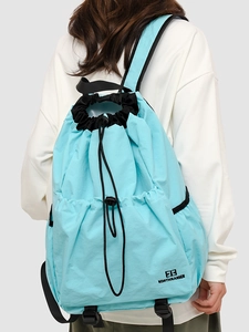 Lightweight sky blue drawstring sports backpack with logo for outdoor hiking and camping