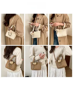 Detailed views of crossbody bucket bags in beige and brown with cute bear charms
