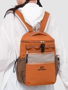Waterproof orange hiking backpack with mesh pocket and Northnansen logo for travel