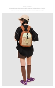 Detail shot of the back view of a tricolor nylon backpack with adjustable straps