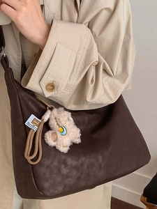 Vintage dark brown faux leather tote bag with plush bear charm and large capacity
