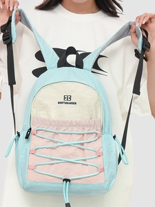 Three-color patchwork sports backpack in blue and pink with breathable mesh straps