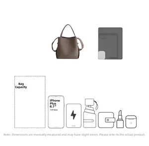 Detail view of the spacious interior of the taupe bucket bag for daily essentials