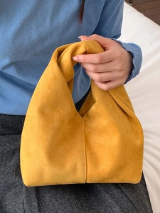 Chic mustard yellow pleated cloud handbag with unique knotted handle for daily fashion