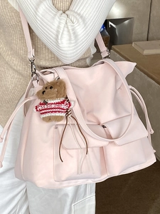 Pink large capacity shoulder tote bag with front pockets and cute teddy bear charm