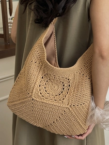 Handmade crochet cotton weave shoulder bag with hollow flower pattern for beach vacation