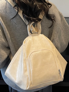 Minimalist beige PU leather teardrop backpack for women featuring U-shaped zipper pocket