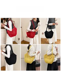 Detailed close-up of large crochet tote bags in red, black, and yellow mesh knit styles