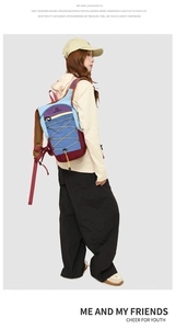 Detail view of colorful outdoor backpack with elastic drawstring and color-block design