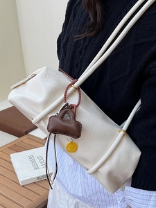 White lychee pattern Boston shoulder bag with brown leather pouch and smiley charm