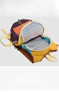 Detail view of the backpack interior showing spacious compartments and mesh pockets