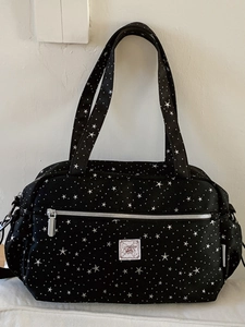 Black star pattern nylon shoulder bag with silver zipper and large capacity for daily commuting