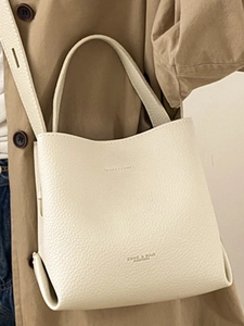 White lychee pattern leather bucket bag with top handle and adjustable shoulder strap