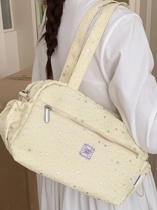 Cream yellow star pattern crossbody bag with large capacity and shoulder straps
