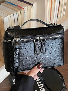 Elegant black ostrich pattern box handbag for women with top handle and crossbody strap