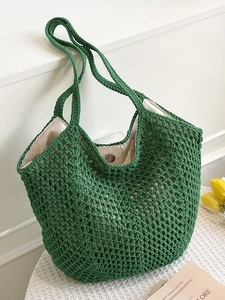 Green woven hollow knit tote bag with magnetic closure and inner beige fabric lining