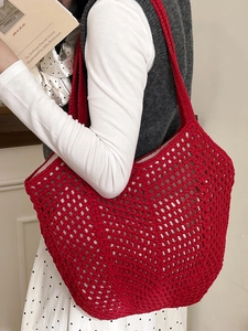 Red crochet hollow-out knit tote bag with large mesh pattern for beach and vacation