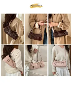 Viste dettagliate della borsa baguette vintage con tasche laterali e fibbie in metallo