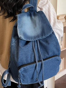 Vintage large capacity blue denim backpack for women with drawstring and flap closure
