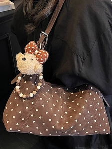 Brown polka dot shoulder bag with cute teddy bear charm and decorative beads for women