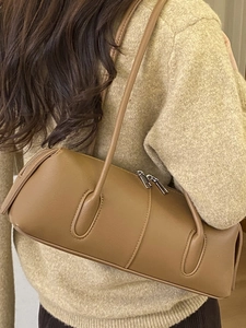 Minimalist brown leather cylinder shoulder bag with double zipper for women's daily commute
