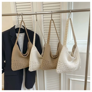 Detail of four woven tote bags in neutral tones showing bohemian crochet patterns