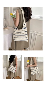 Detailed close-up showing the hollow hand-woven knit texture and striped pattern of the tote bag