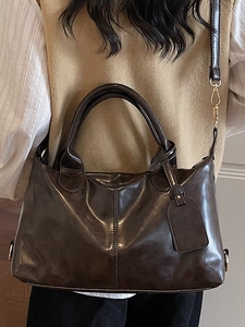 Large capacity dark brown glossy handbag for women with vintage style and shoulder strap