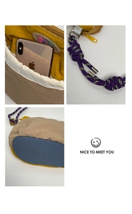 Detailed view of tricolor nylon crossbody bag showing interior capacity and woven strap