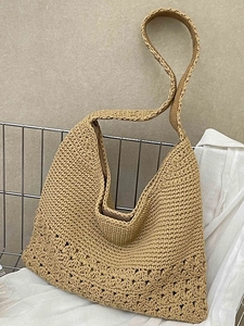 Chic beige crochet tote bag with openwork floral patterns for beach or casual travel