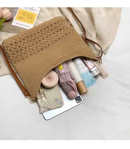 Detail of hand-woven crochet crossbody bag with spacious interior for daily essentials