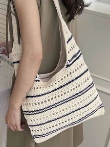 Chic cream and navy blue woven hollow tote bag with large capacity for women's daily commute
