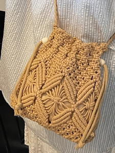 Minimalist handmade bohemian straw woven bucket bag with elegant beaded drawstring closure