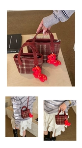 Detailed comparison of two sizes for burgundy plaid tweed tote bag with red horse charm