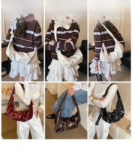 Detail view of large crescent hobo bags in white, burgundy, brown, and black colors