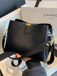 Classic black litchi pattern bucket bag with golden hardware and wide shoulder strap