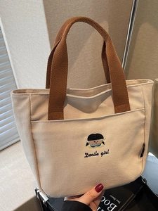Sac fourre-tout minimaliste en toile blanc cassé avec broderie et anses brunes