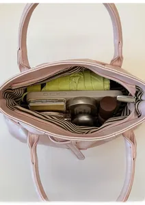 Top view of pink PU leather bucket bag interior showing large capacity for daily essentials
