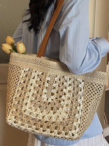 French style handmade woven straw tote bag with brown leather straps for beach holidays