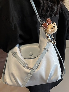 Minimalist light blue PU leather tote bag with soft pleats and cute plush bear charm