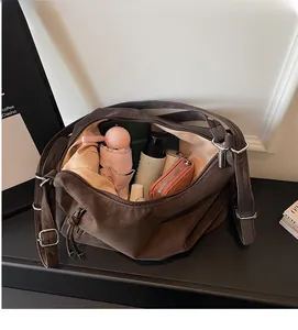 Top-down view of spacious dark brown tote bag showing organized interior storage capacity