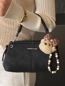 Large black shoulder bag for women with fashion bear pendant and beaded chain accessory