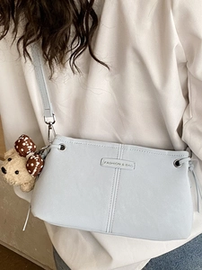 Chic light blue large capacity crossbody bag with a cute plush bear charm for women