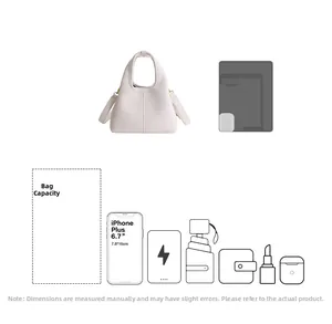 Detail view of white lychee pattern bucket bag showing large interior capacity and strap