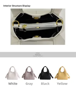 Macro shot of leather bucket bag interior showing zip pocket and gold hardware detail