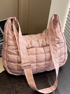 Borsa a tracolla trapuntata rosa con trama a griglia e tracolla regolabile donna