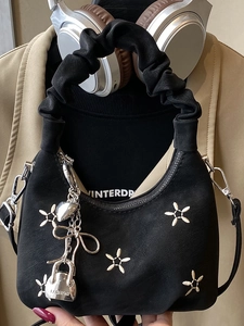 Black pleated dumpling handbag with white flower embroidery and stylish silver charms