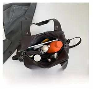 Internal view of large vintage tote bag showing space for tablet and essentials