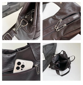 Detail view of coffee brown faux leather bag showing pin zipper and hidden side pocket