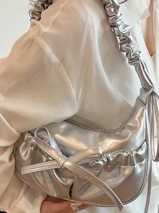 Metallic silver ruched shoulder bag with bow detail and pleated strap for women